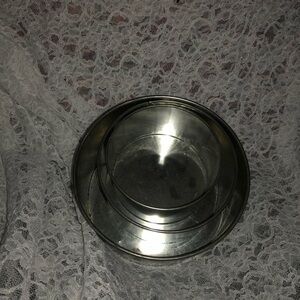 A set of three fruitcake/ wedding cake baking pans. Non removable bottoms